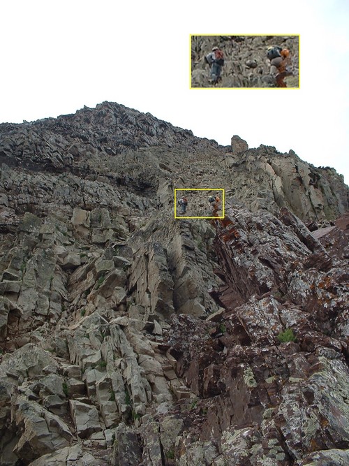 Climbers high on Pyramid Peak